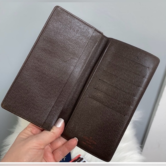 100% authentic Louis Vuitton Damier Ebene (DE) long vertical wallet organizer. - Picture 6 of 15